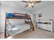 Bright ' bedroom featuring bunk beds and white dresser at 5545 Whitebark Dr., Myrtle Beach, SC 29577