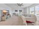 Bonus room with ceiling fan, large tv, piano and window at 5545 Whitebark Dr., Myrtle Beach, SC 29577