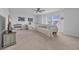 Large bonus room with a ceiling fan, daybed and white couch at 5545 Whitebark Dr., Myrtle Beach, SC 29577