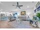 Open-concept living room and kitchen area with modern decor and ample natural light at 5545 Whitebark Dr., Myrtle Beach, SC 29577