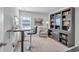 Functional home office space with a desk, chair, and built-in shelving at 5545 Whitebark Dr., Myrtle Beach, SC 29577