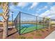 Well maintained blue and green fenced tennis court in a community setting at 5545 Whitebark Dr., Myrtle Beach, SC 29577