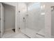 Bright bathroom featuring frameless glass shower and horizontal window allowing natural light at 57 Eagle Claw Dr., Carolina Shores, NC 28467