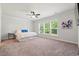 Bright and airy bedroom featuring plush carpet, ample natural light, and plenty of space at 57 Eagle Claw Dr., Carolina Shores, NC 28467