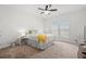 Cozy bedroom featuring carpet floors, natural light, a ceiling fan, and comfortable furnishings at 57 Eagle Claw Dr., Carolina Shores, NC 28467