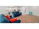 Bright living room showcases an open concept design with hardwood floors and stylish furnishings at 57 Eagle Claw Dr., Carolina Shores, NC 28467