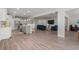 Spacious open-concept living room seamlessly blending the kitchen and seating areas at 57 Eagle Claw Dr., Carolina Shores, NC 28467