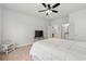 Spacious main bedroom with ensuite bathroom, a ceiling fan, and neutral colors at 57 Eagle Claw Dr., Carolina Shores, NC 28467