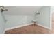 Finished attic space with neutral paint and carpet, bright with natural light at 57 River Birch Ln., Pawleys Island, SC 29585