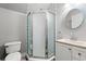 Cozy bathroom with walk-in shower, stylish vanity and subway tile at 57 River Birch Ln., Pawleys Island, SC 29585