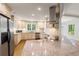 Well-appointed kitchen with stainless steel appliances, granite countertops, and ample cabinet space at 57 River Birch Ln., Pawleys Island, SC 29585