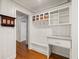 Functional mudroom with built-in storage bench, hooks, and countertop space at 57 River Birch Ln., Pawleys Island, SC 29585