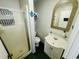 Bathroom features a shower, toilet, mirrored vanity, and tiled flooring at 6001 - 1864 S Kings Hwy., Myrtle Beach, SC 29575