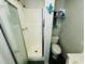 This bathroom features a walk-in shower, toilet, and single sink at 6001 - 1864 S Kings Hwy., Myrtle Beach, SC 29575