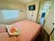 Charming bedroom featuring a comfortable bed, nautical decor, and a TV at 6001 - 1864 S Kings Hwy., Myrtle Beach, SC 29575