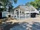 Charming coastal home with a welcoming front porch and a lush, green yard at 6001 - 1864 S Kings Hwy., Myrtle Beach, SC 29575
