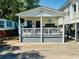 Charming coastal home with a welcoming front porch, ideal for relaxing and entertaining at 6001 - 1864 S Kings Hwy., Myrtle Beach, SC 29575