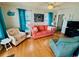 Cozy living room featuring bright decor, comfortable seating, and coastal-themed accents at 6001 - 1864 S Kings Hwy., Myrtle Beach, SC 29575