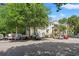 Exterior shot of a condo building with a parking area at 601 Hillside Dr. # 4424, North Myrtle Beach, SC 29582