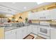 Well-lit kitchen offering a breakfast bar and an open layout connecting to the living area at 601 Hillside Dr. # 4424, North Myrtle Beach, SC 29582