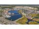 Aerial view showcasing the vibrant shopping district and serene waterway with beautiful bridges at 6015 Catalina Dr. # 332, North Myrtle Beach, SC 29582