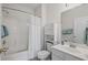 Bathroom with shower-tub, white cabinets and modern fixtures at 6015 Catalina Dr. # 332, North Myrtle Beach, SC 29582