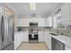 Contemporary kitchen with stainless steel appliances and quartz countertops at 6015 Catalina Dr. # 332, North Myrtle Beach, SC 29582
