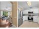Modern kitchen with stainless steel appliances, granite countertops, and tile backsplash at 6015 Catalina Dr. # 332, North Myrtle Beach, SC 29582