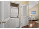 This condo features a convenient laundry closet with a stacked washer and dryer at 6015 Catalina Dr. # 332, North Myrtle Beach, SC 29582