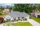 Charming single-story home with a well-manicured lawn and inviting front porch, nestled in a serene neighborhood at 605 Cavandish Dr., Myrtle Beach, SC 29588
