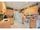 Functional kitchen with wooden cabinets and modern appliances at 605 Cavandish Dr., Myrtle Beach, SC 29588