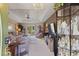Bright living room with access to outdoor patio and decorative display cabinet at 605 Cavandish Dr., Myrtle Beach, SC 29588