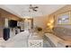 Open-concept living room with neutral tones, ceiling fan, and stylish decor at 605 Cavandish Dr., Myrtle Beach, SC 29588