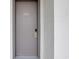 A gray hotel room door in a well-lit hallway has a silver number 228 at 6803 N Ocean Blvd. # 228, Myrtle Beach, SC 29572