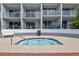 Relax in this inviting hot tub near condos with balconies and enjoy the convenience of poolside relaxation and leisurely moments at 6803 N Ocean Blvd. # 228, Myrtle Beach, SC 29572
