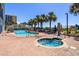 Enjoy poolside lounging with palm trees, hot tub and a bridge to the beach for ultimate relaxation and scenic views at 6803 N Ocean Blvd. # 228, Myrtle Beach, SC 29572