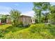 A landscape view of the wooden gazebo and shed in the backyard at 719 Juniper Dr., Myrtle Beach, SC 29575