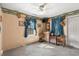 This is a view of a bedroom decorated with wallpaper, hats, and tapestries at 719 Juniper Dr., Myrtle Beach, SC 29575