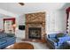 Comfortable living room with a classic brick fireplace, white built-ins, and a cozy atmosphere at 719 Juniper Dr., Myrtle Beach, SC 29575