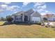 Charming single-story home featuring manicured landscaping, an attached garage, and a welcoming entrance at 748 Choctaw Dr., Conway, SC 29526