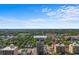 Aerial view showcases the building's location on N Ocean Blvd with a backdrop of lush greenery at 7509 N Ocean Blvd. # 404, Myrtle Beach, SC 29572