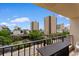 Enjoy city views from this condo balcony with seating, perfect for relaxing outdoors at 7509 N Ocean Blvd. # 404, Myrtle Beach, SC 29572