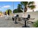 Outdoor grilling area featuring two grills and ample seating, perfect for entertaining at 7509 N Ocean Blvd. # 404, Myrtle Beach, SC 29572