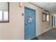 Welcoming unit entrance with a decorated door and beach themed wreath at 7509 N Ocean Blvd. # 404, Myrtle Beach, SC 29572