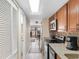 Modern kitchen featuring stainless steel appliances, tile backsplash, and granite counters at 7509 N Ocean Blvd. # 404, Myrtle Beach, SC 29572