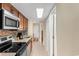 Kitchen showcases granite countertops, wooden cabinets, and stainless steel appliances at 7509 N Ocean Blvd. # 404, Myrtle Beach, SC 29572