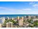 Expansive ocean view featuring a beautiful blue skyline and surrounding buildings at 7509 N Ocean Blvd. # 404, Myrtle Beach, SC 29572