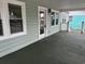 Spacious front porch with great windows provides ample light and curb appeal to this cozy home at 803 34Th Ave. S, North Myrtle Beach, SC 29582