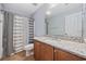 Well-lit bathroom featuring a vanity with granite countertop and shower-tub combo at 854 Falkirk St., Myrtle Beach, SC 29579