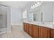 Bathroom boasts a double vanity, soaking tub, and a separate marble tiled shower at 854 Falkirk St., Myrtle Beach, SC 29579